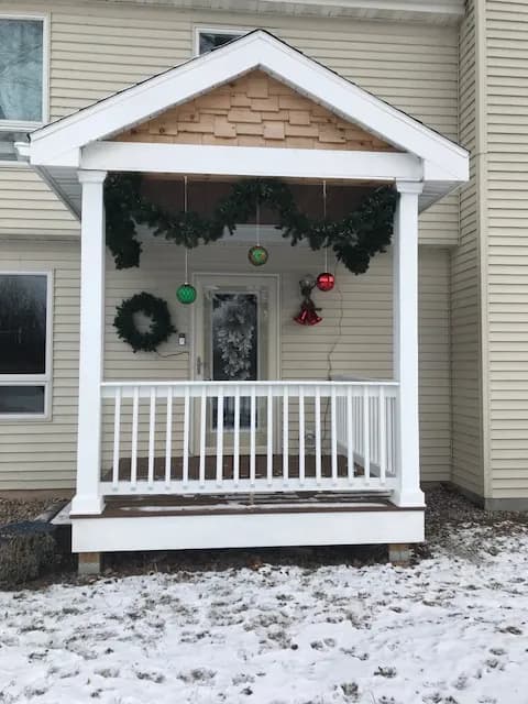 Covered Porch Built Finished Black Wolf